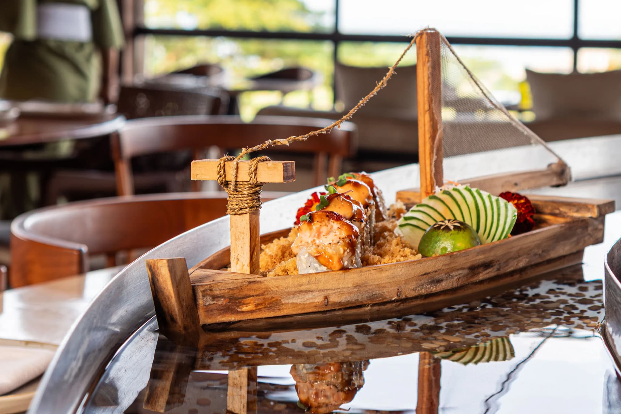 Sushi boat presented at Tsune Sanur